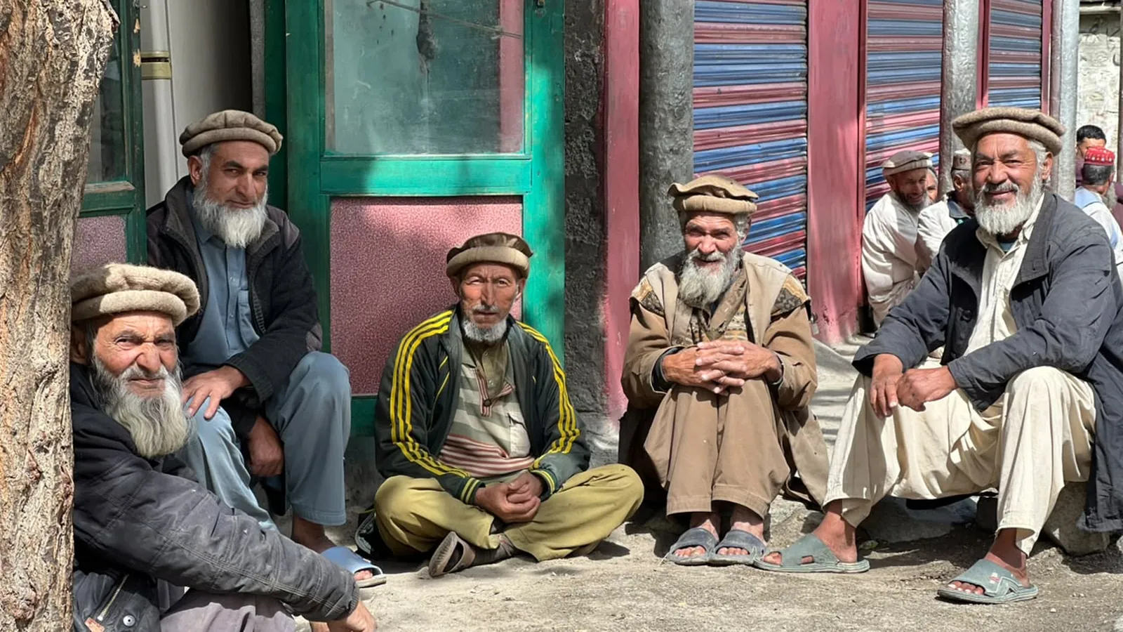 Village Elders Sitting Together In Conversation