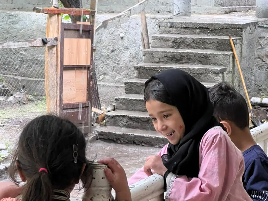 Village elders sitting together during a community visit